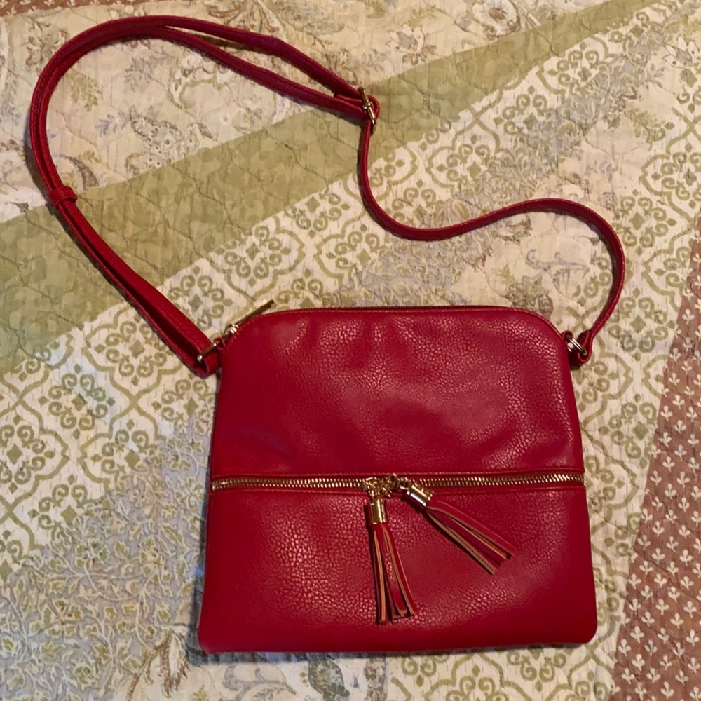 Red purse with tassels